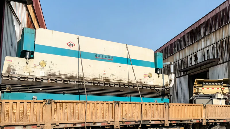 Used press brake manual loading in workshop